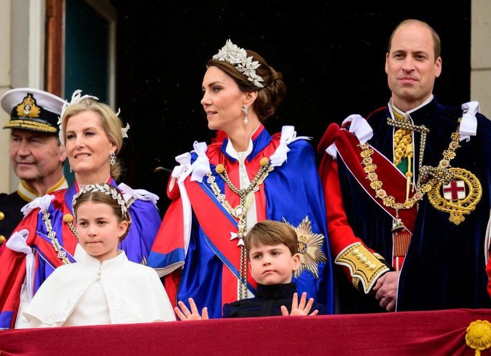 Prince Louis on the Buckingham Palace balcony with Princess Charlotte and the Prince and Princess of Wales