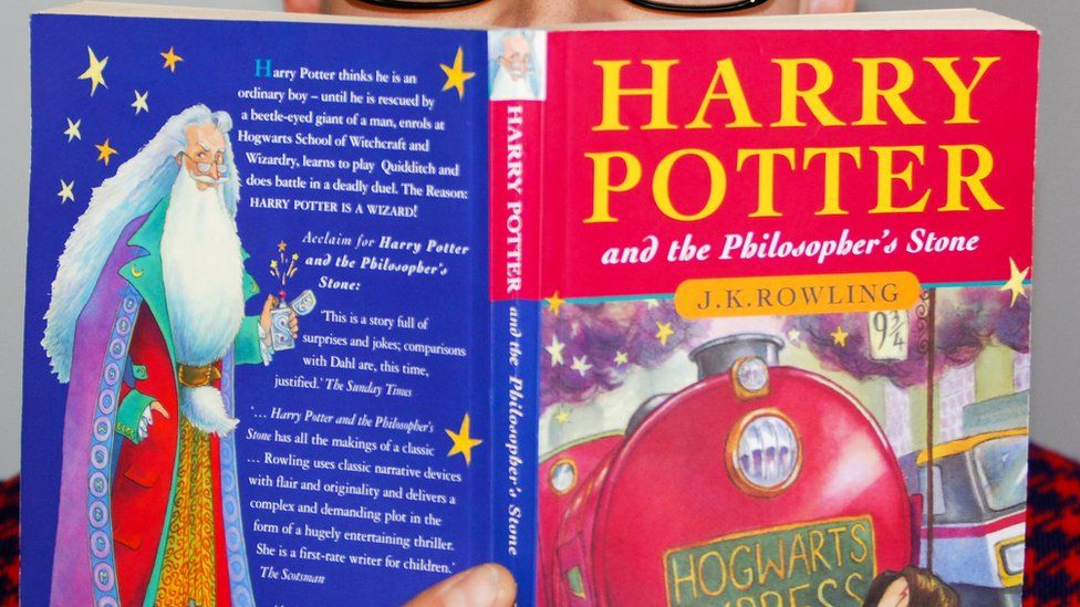 back and front cover of a copy of Harry Potter and the Philosopher's Stone