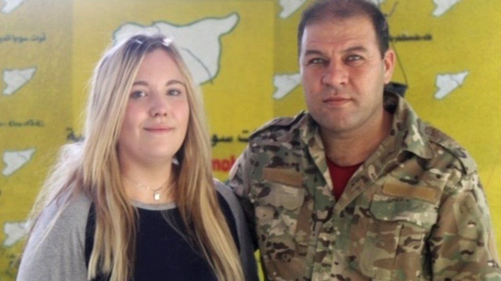 Bethany Haines and YPG officer