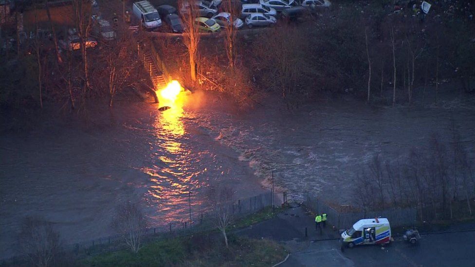 Burning gas main on the edge of the River Irwell in Radcliffe, Greater Manchester on 26 December 2015