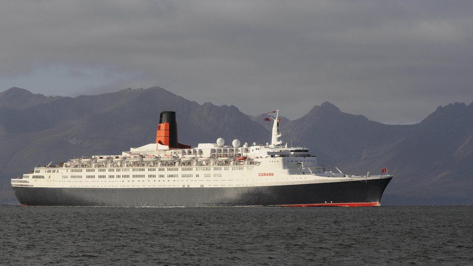 The QE2 cruise liner enters the Firth of Clyde past the Isle of Arran in 2008