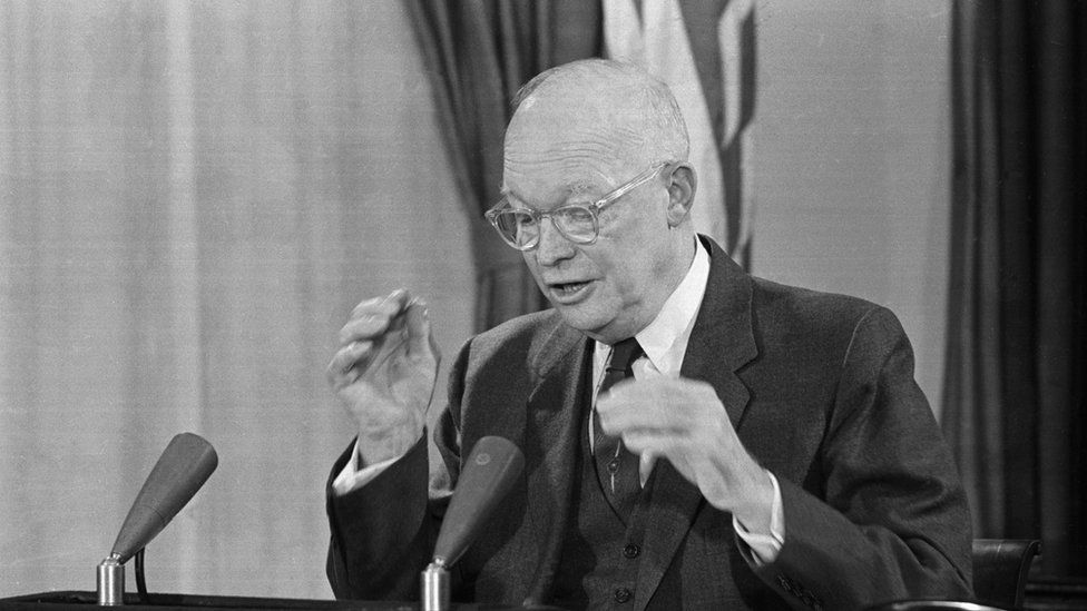1/17/1961-Washington, DC-: President Dwight D. Eisenhower gestures during his farewell speech to the American people from the White House