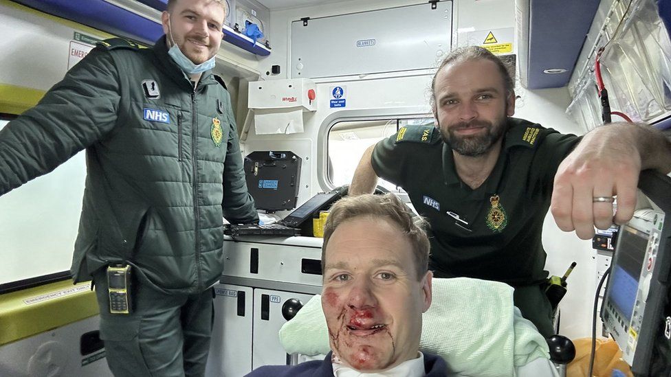 Dan Walker in an ambulance with two NHS staff after a car accident