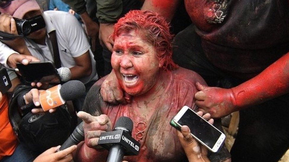 Patricia Arce speaks to the media after being attacked by a crowd that sprayed her with reddish paint and cut her hair in Vinto, Bolivia, 06 November 2019