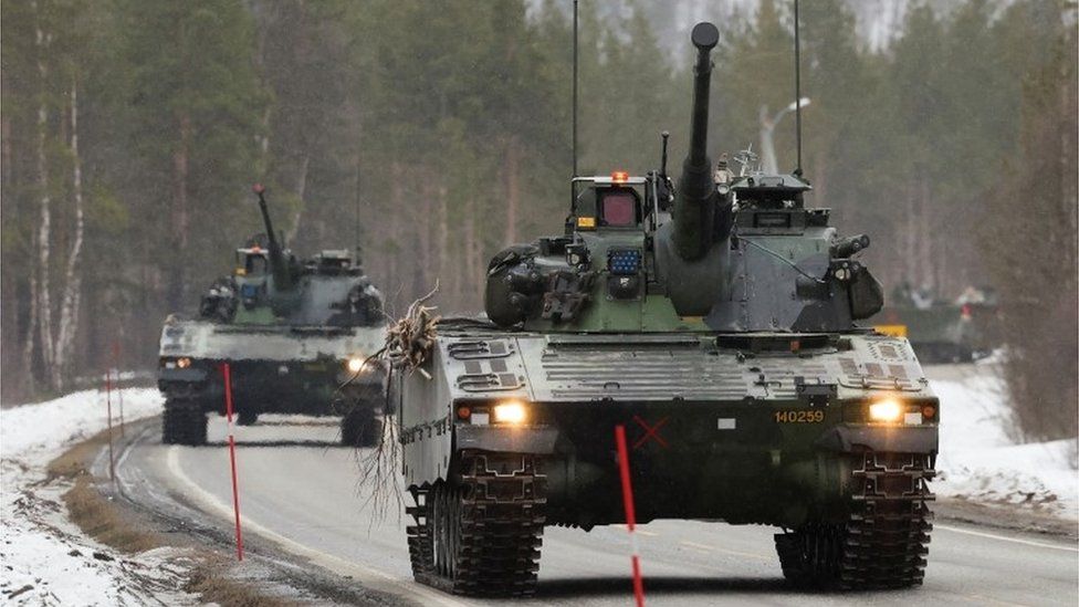 Swedish Army tanks participate in a military exercise called "Cold Response 2022", gathering around 30,000 troops from NATO member countries as well as Finland and Sweden, amid Russia"s invasion of Ukraine, in Setermoen in the Arctic Circle, Norway