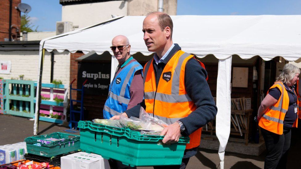 Prince William loads food deliveries into vans