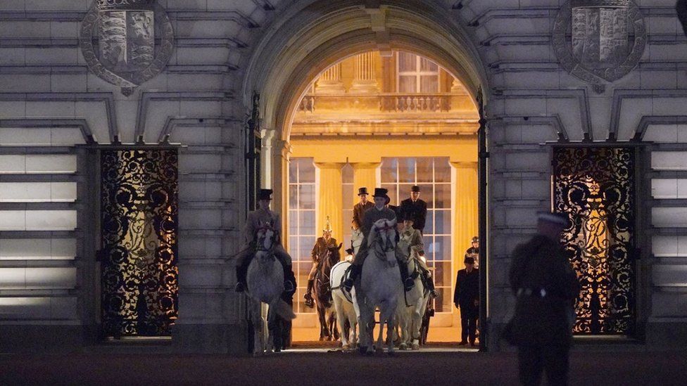 Members of the military were seen departing Buckingham Palace - but Charles and Camilla were nowhere in sight during the rehearsal