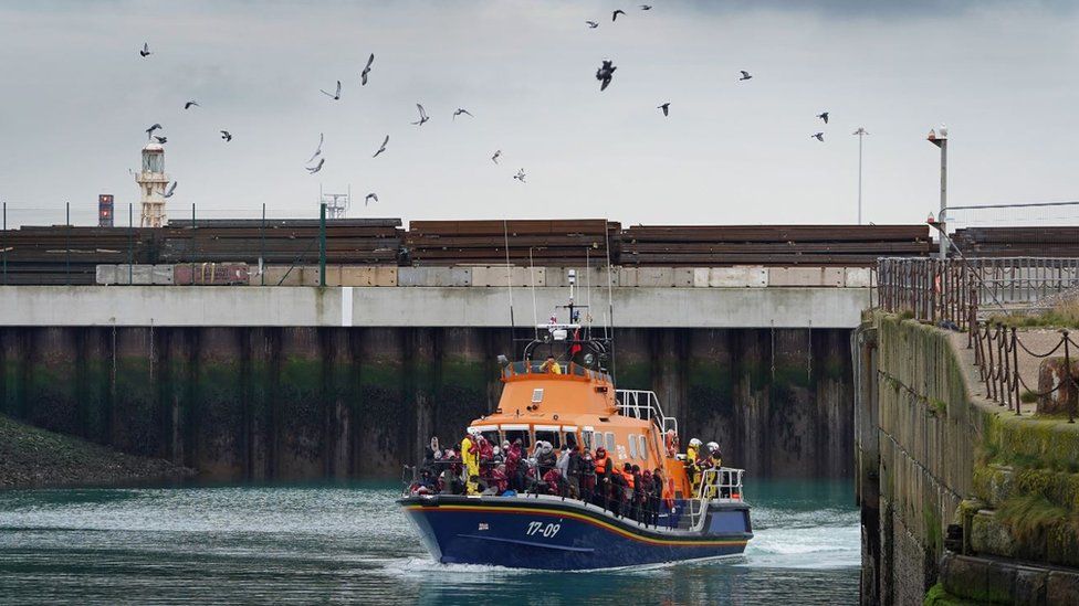 An RNLI boat brings people ashore at Dover