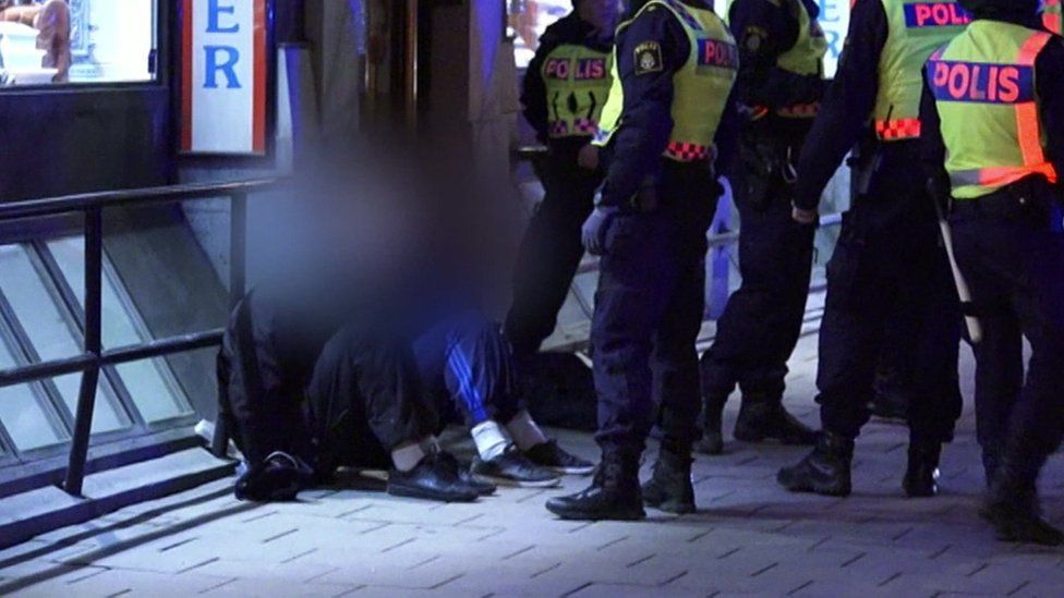 Police detain suspects in Stockholm after masked men clashes with officers