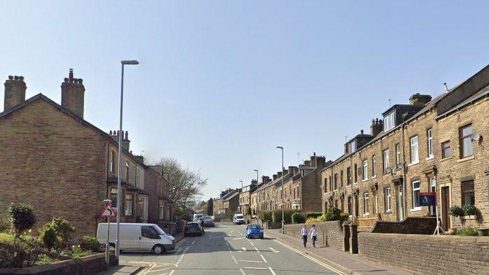 Littleborough crash: Worker struck and killed by car at roadside - BBC News