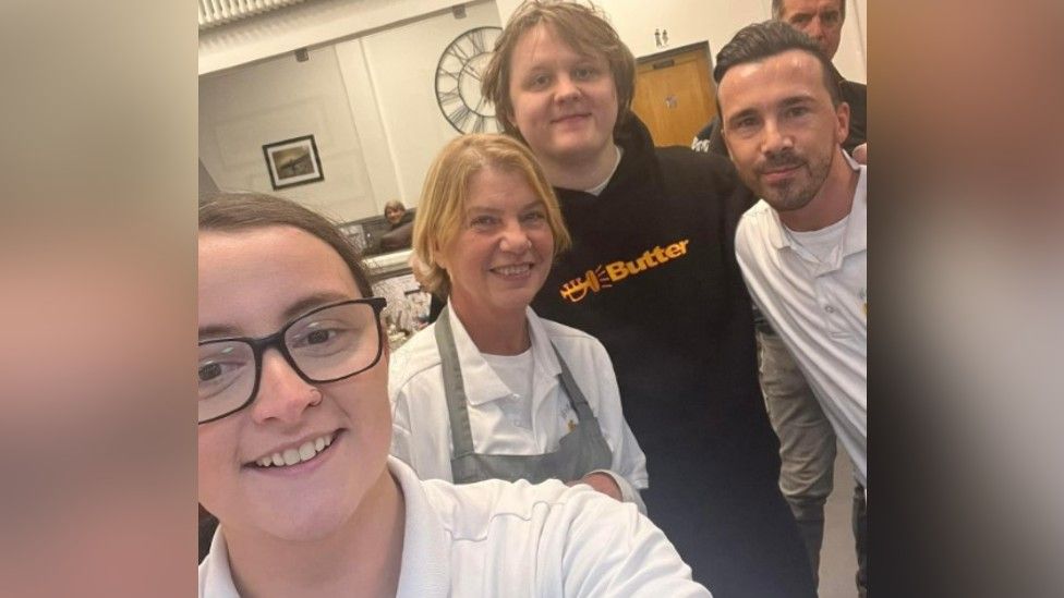 Lewis Capaldi with staff
