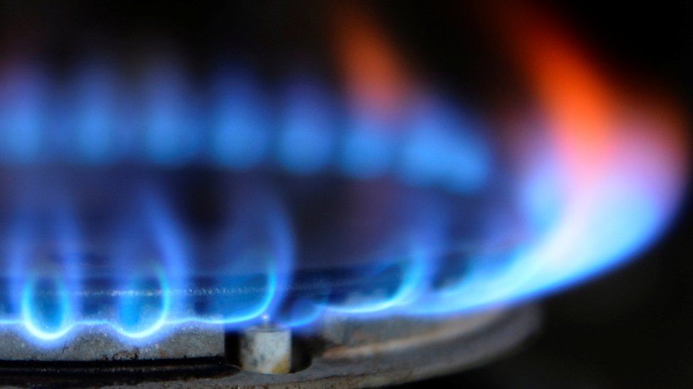 A blue flame from a gas hob