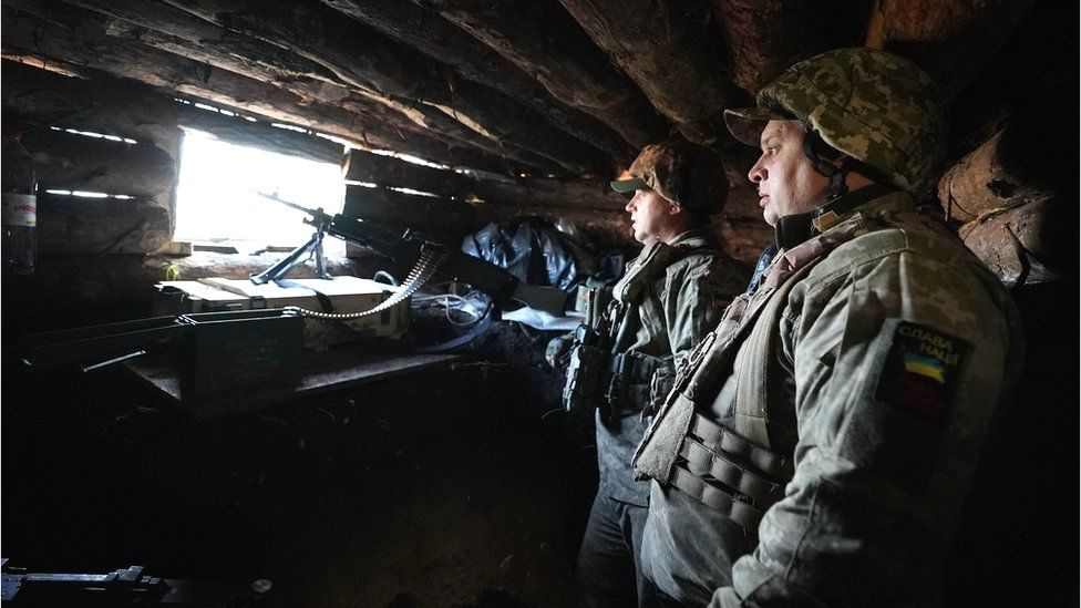 Officers with Ukraine's 77 Brigade prepare to direct artillery fire to support their infantry