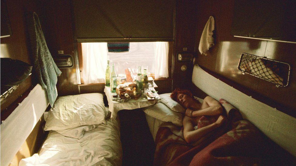 A photo of David Bowie in a caravan