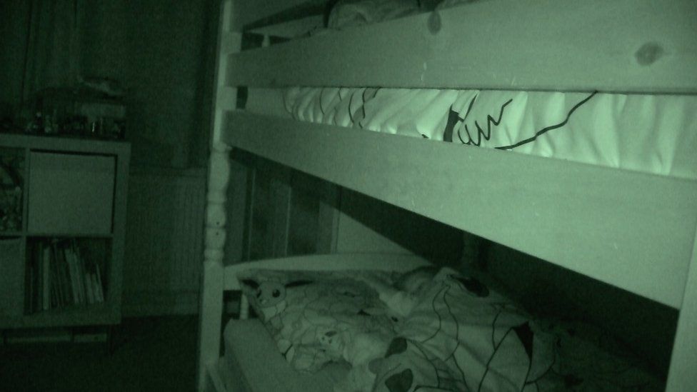 boys asleep in bunk beds
