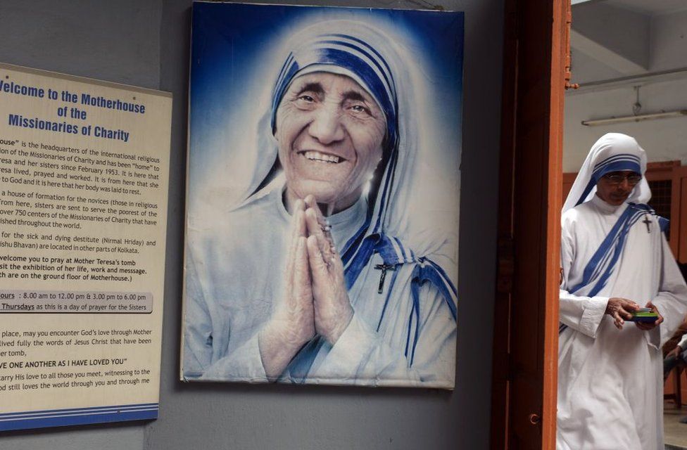 An Indian nun from the Catholic Order of the Missionaries of Charity leaves after taking part in a mass to commemorate the 105th birthday of Mother Teresa at the Indian Missionaries of Charity house in Kolkata on August 26, 2015.