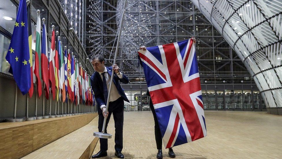 The UK flag is removed from the European Council building in Brussels.