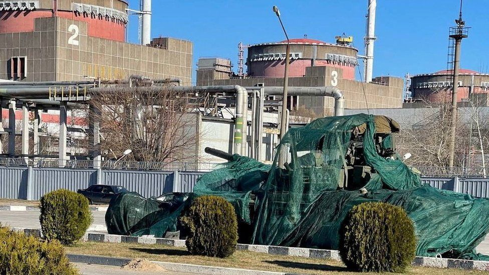 A covered Russian tank outside the Zaporizhzhia nuclear power plant on 4 August