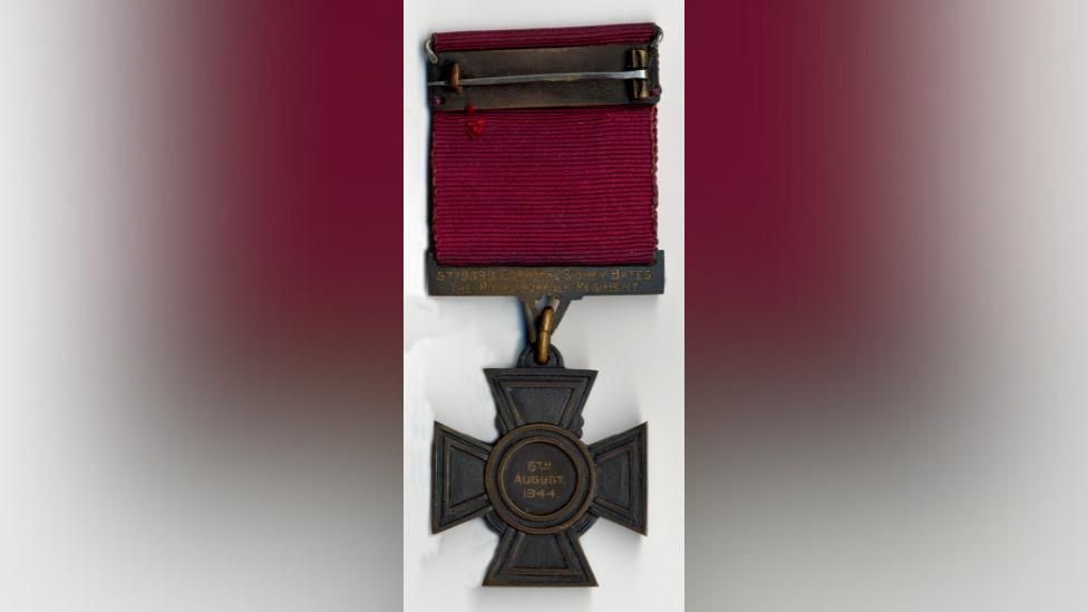 Victoria Cross with red ribbon