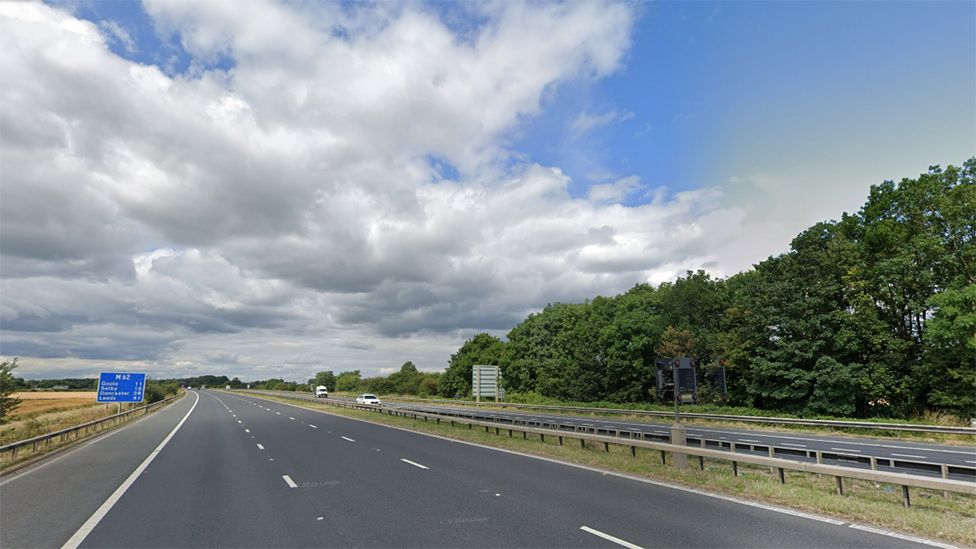 East Yorkshire motorway closed after skip falls off lorry BBC News