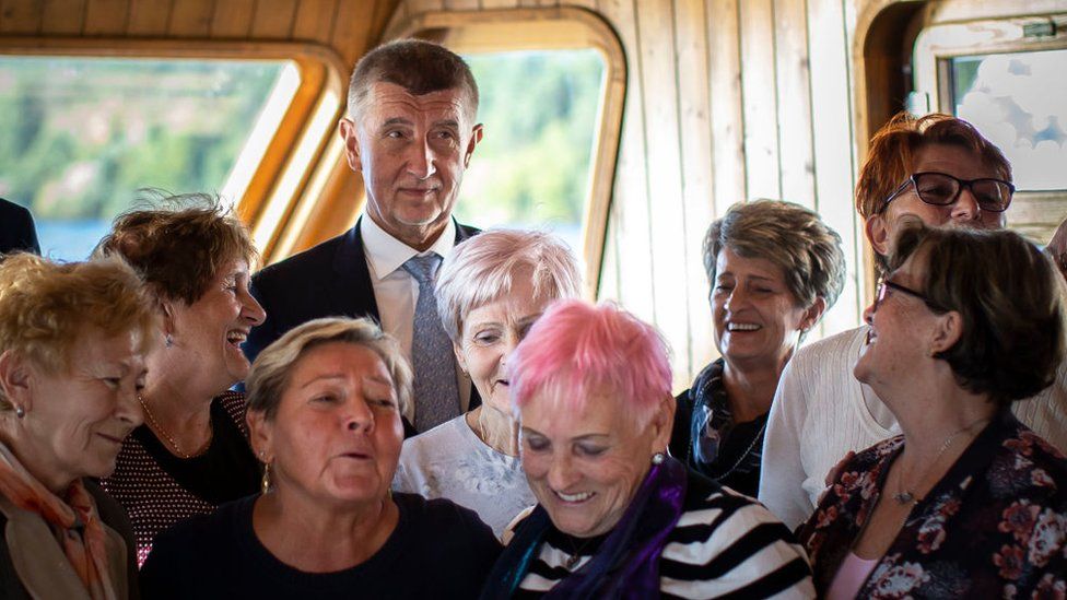 Czech Prime Minister Andrej Babis poses for a photograph with fans during his campaign cruise with supporters on a ship at Brno Reservoir on October 01, 2021