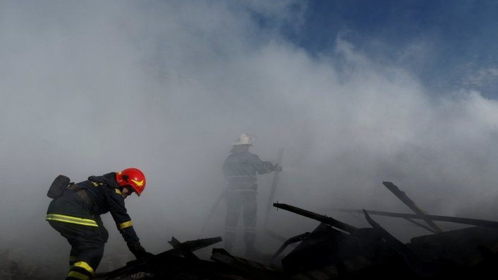 Firefighter puts out fire