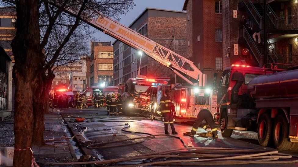 52 dead in Johannesburg apartment block fire - BBC News