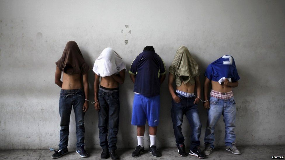 Suspected members of the 18th Street gang are presented to the media after they were arrested and accused of collaboration in the organization of attacks against bus drivers during the third day of a suspension of public transport services in San Salvador, El Salvador July 29, 2015.