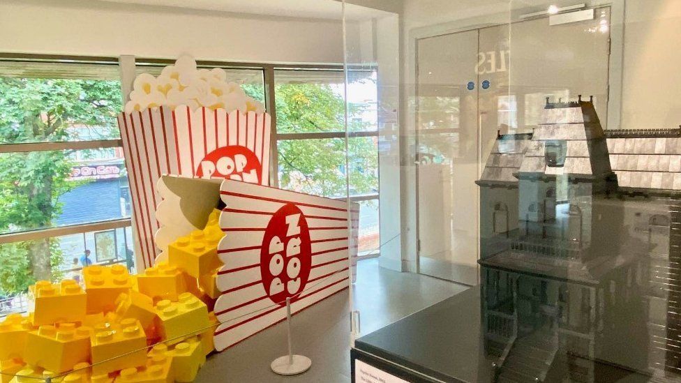 Giant Lego-like blocks forming a carton of popcorn