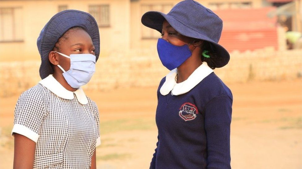 Students of Ruvheneko Primary school in Ruwa wear face masks on their first day at school after six months of closure, in Harare, Zimbabwe, 28 September 2020. Public examinations students have returned to school in time for their final year examinations in December 2020