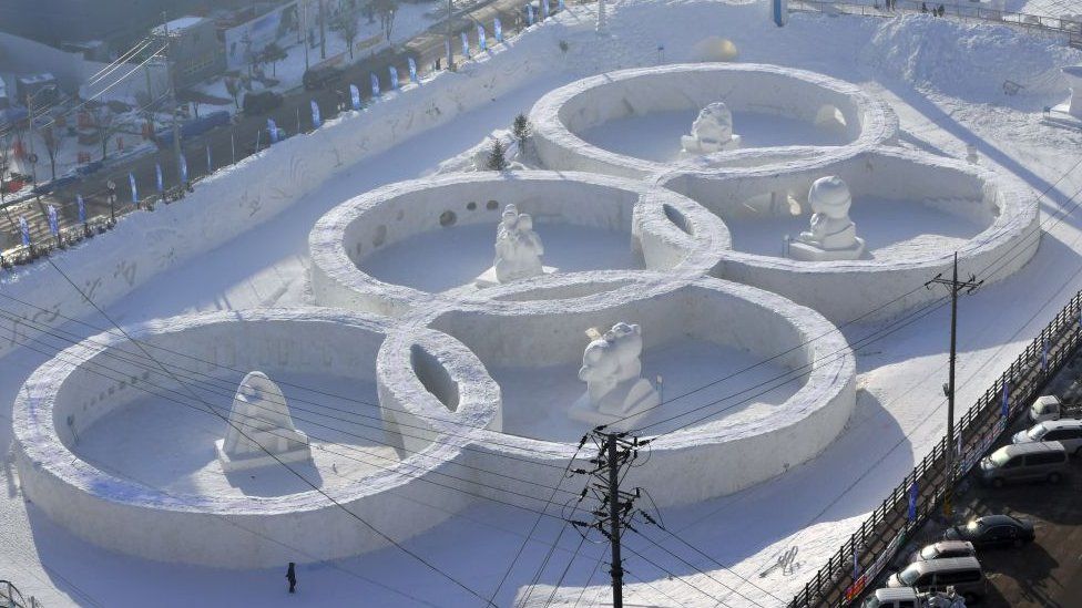 This photo taken February 4, 2017 shows the snow sculpture shaped of the Olympic rings at the town of Hoenggye
