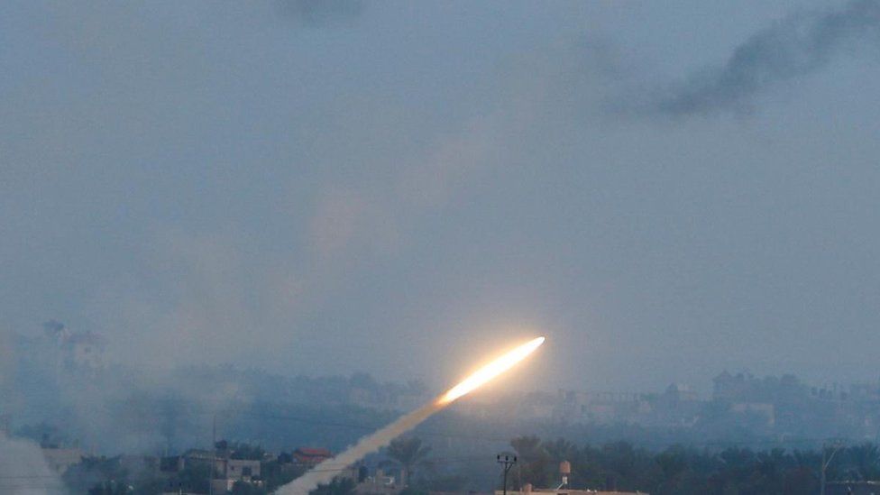 Rockets are fired by Palestinian militants into Israel, in Gaza October 7, 2023.