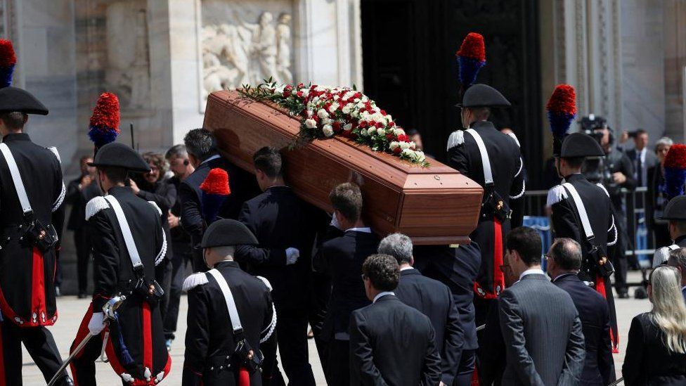 Pallbearers carry the coffin of former Italian Prime Minister Silvio Berlusconi during his funeral at the Duomo Cathedral, in Milan, Italy June 14, 2023