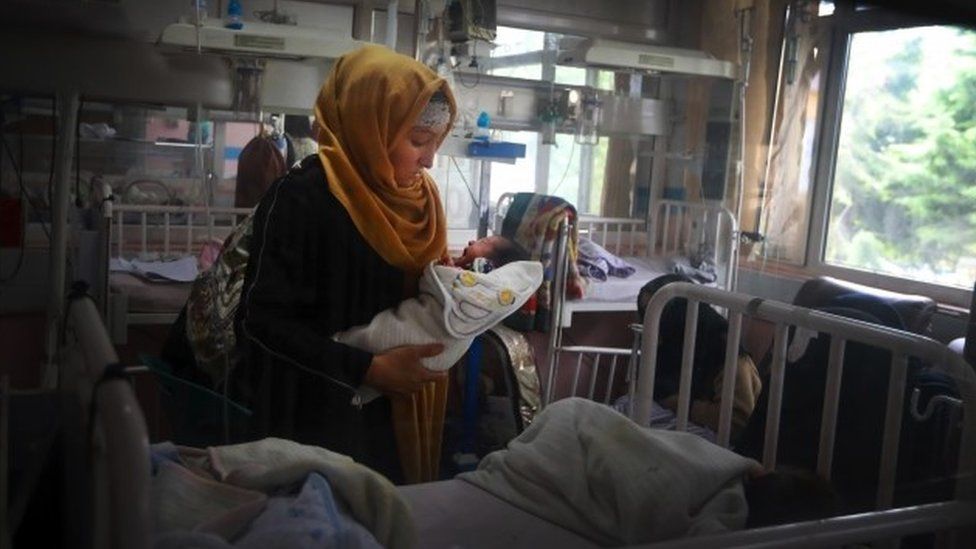 rescued mother and her newborn baby receive medical care in a hospital a day after the complex attack at MSF (Doctors without Borders) hospital, in Kabul, Afghanistan,