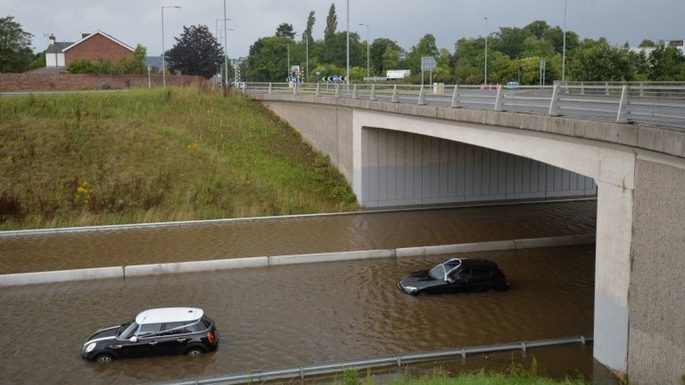A car stranded in flood water