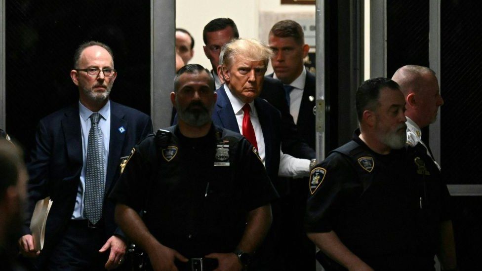 Trump walks to courtroom