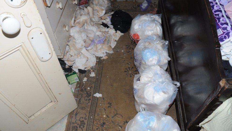 Rubbish and sanitary towels in an upstairs bedroom