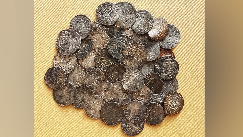 A pile of medieval silver pennies