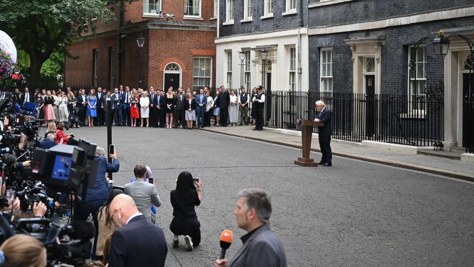 Boris Johnson, the press pack, his wife and supporters in Downing Street