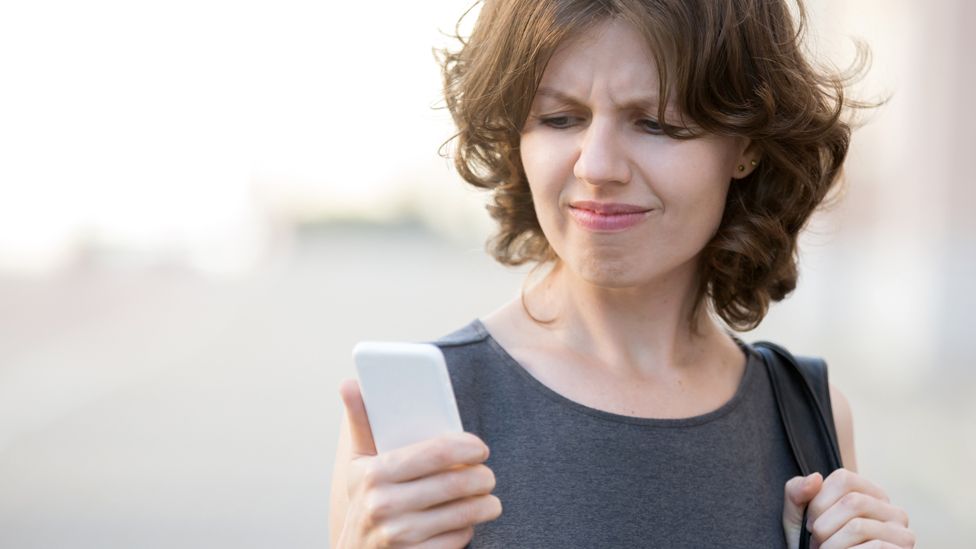 Woman looking at a mobile phone