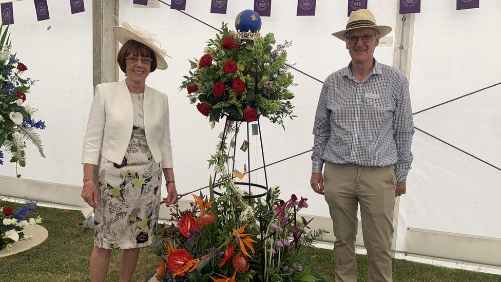 Martyn Davies and Gloria Goodly with the winning floral display in the Garden Village