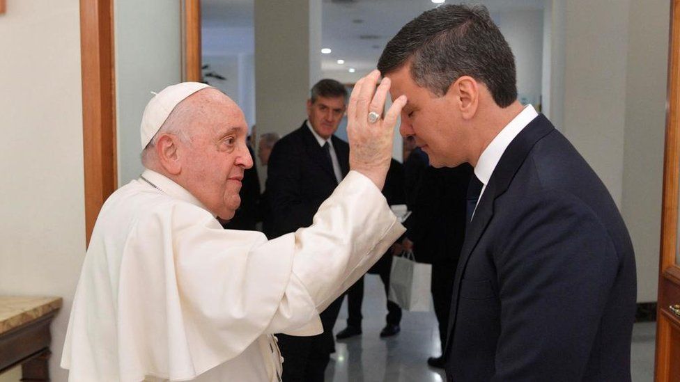 Pope Francis blesses Paraguay's President Santiago Pena at the Vatican on Monday