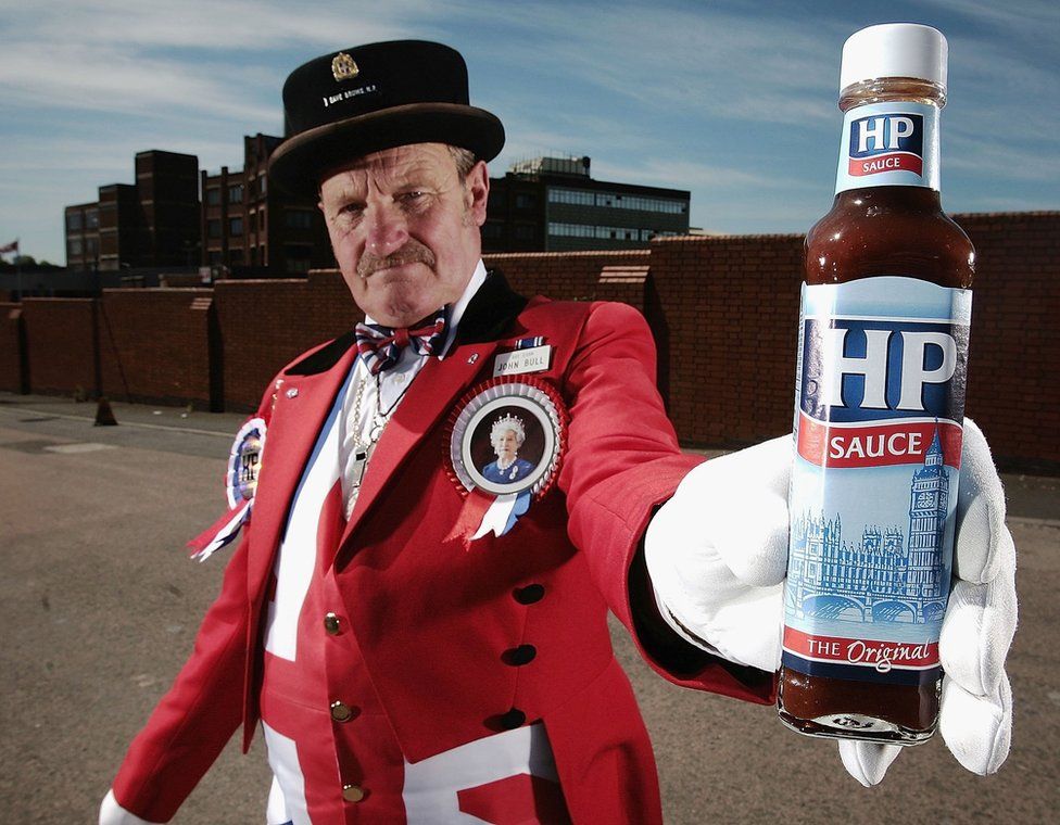 Man holding HP bottle