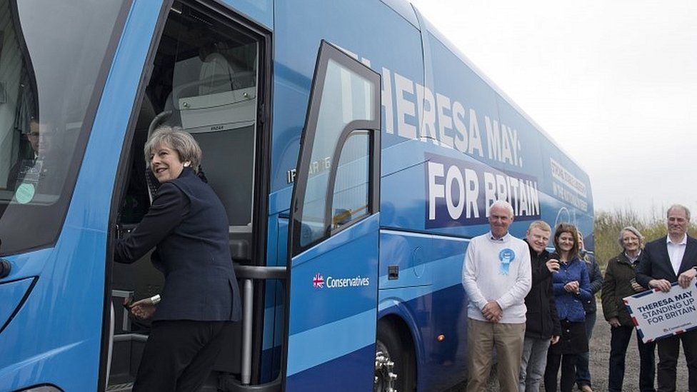 Theresa May boards her party's battlebus in Newcastle