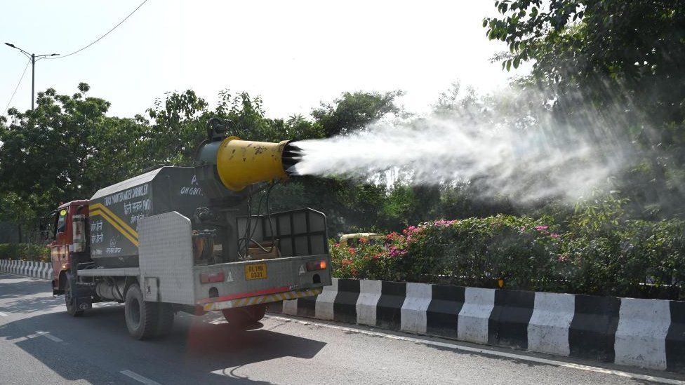 NEW DELHI, INDIA OCTOBER 29: An Anti Smog gun seen sprinkling water over the streets to settle down dust particles amid rise in Pollution Levels at near Hazrat Nizamuddin, on October 29, 2023 in New Delhi, India. (Photo by Arvind Yadav/Hindustan Times via Getty Images)