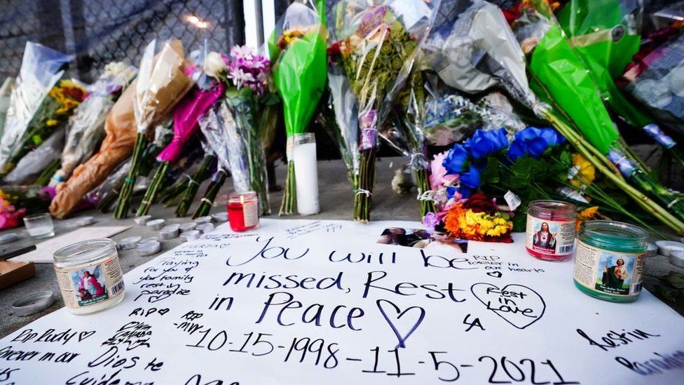 Candles, flowers and letters are placed at a memorial outside of the canceled Astroworld festival at NRG Park on November 7, 2021 in Houston, Texas