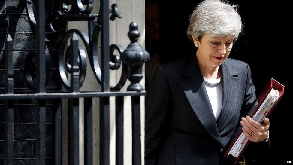 Theresa May leaving Downing Street