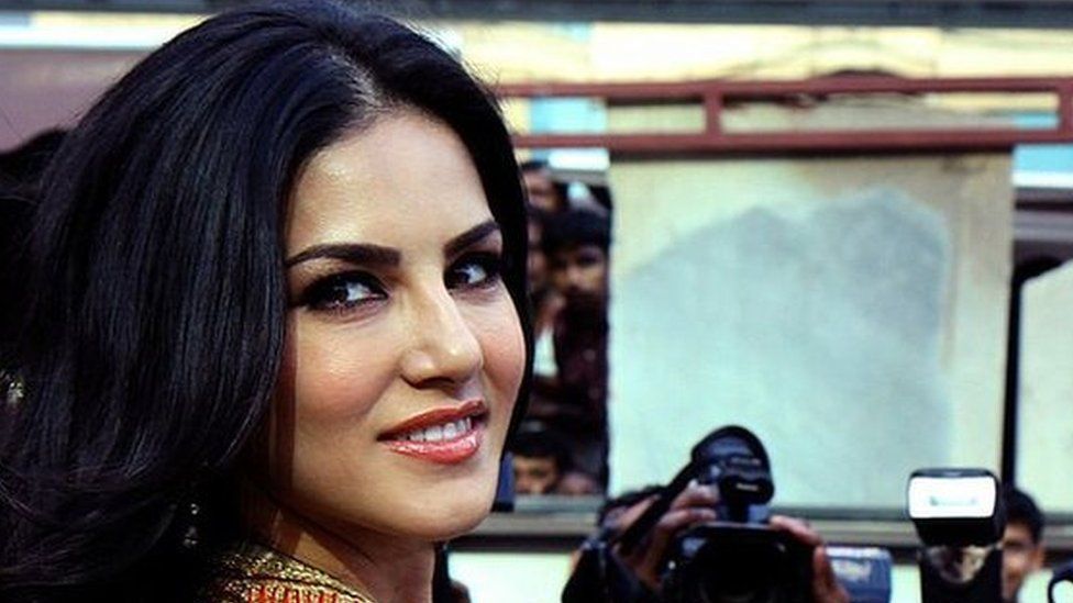Indian actress and former adult film actress Sunny Leone poses for a photograph during a promotional event for the Hindi film Ragini MMS 2 in Mumbai on late March 26, 2014.