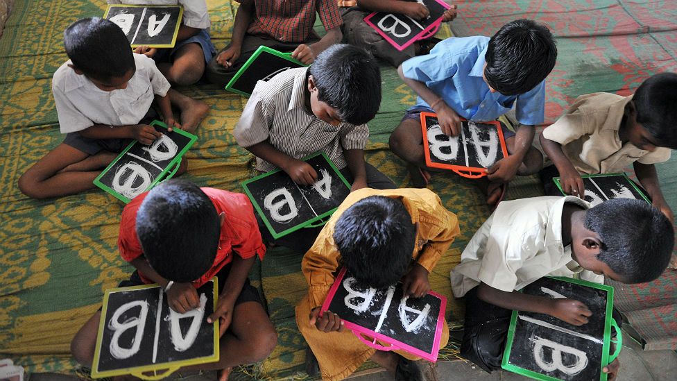 Children learning English in India