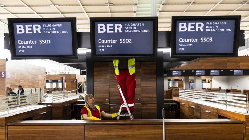Workers are seen at the construction site of the BER Willy Brandt Berlin Brandenburg International Airport in Schoenefeld, Germany on May 8, 2019